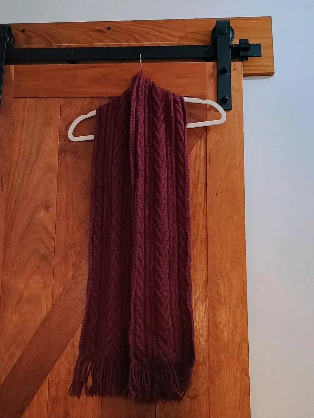 Pointelle cable-knit scarf finished with ample fringe tassels